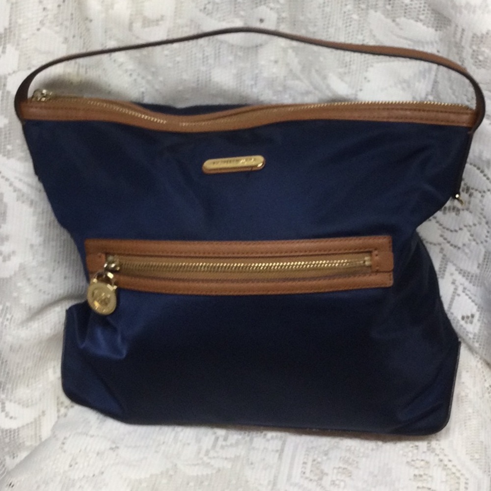 Michael Kors rain proof purse .